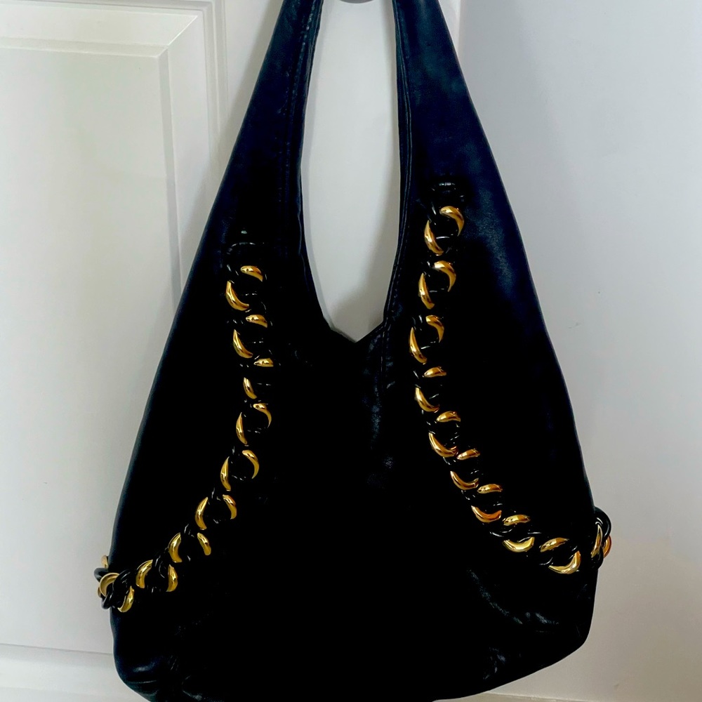Michael Korrs soft leather satchel with hardware and key holder